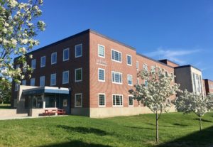 Maine DACF offices are in the Deering and Harlow buildings. The public entrance to the Deering Building is under the blue awning.