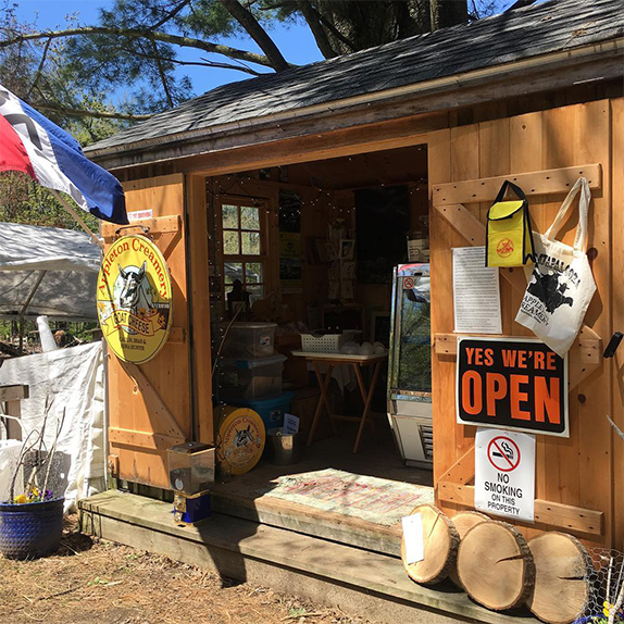 A dairy farmstand in Maine while is open for business